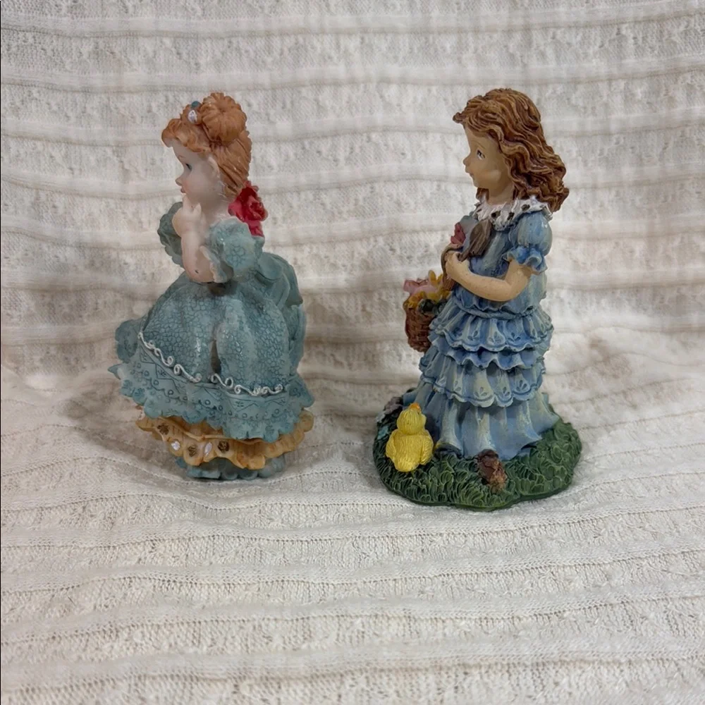 Charming Figurine Set with Blue and Pink Accents